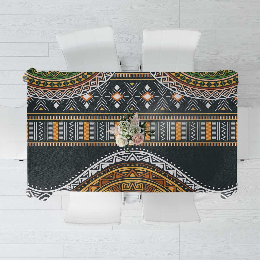 Ethnic pattern tablecloth with black, gold, and white geometric bands