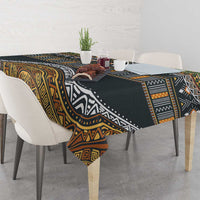 Geometric ethnic tablecloth in black with gold and white tribal motifs