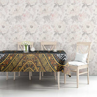 Ethnic geometric tablecloth in dark tones with gold and white patterning