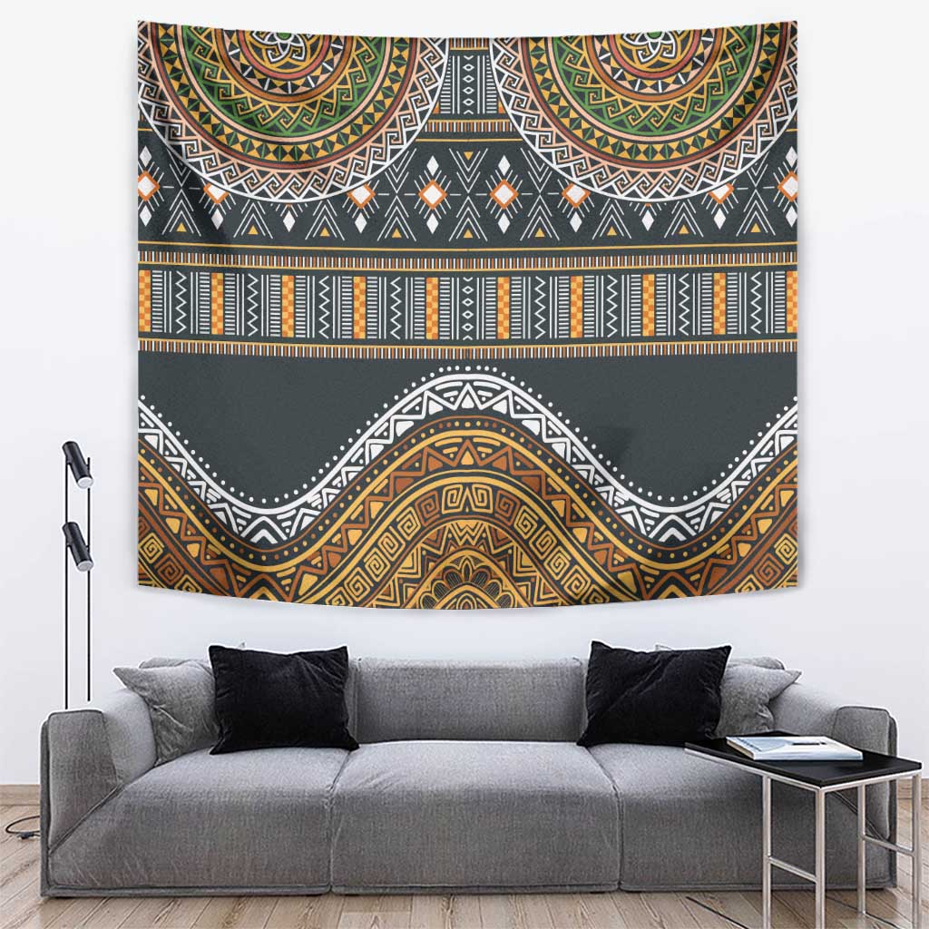 Wall tapestry with dark gray base and gold, orange, green geometric patterns