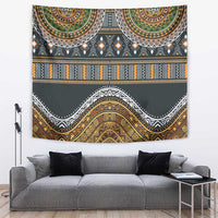 Wall tapestry with dark gray base and gold, orange, green geometric patterns