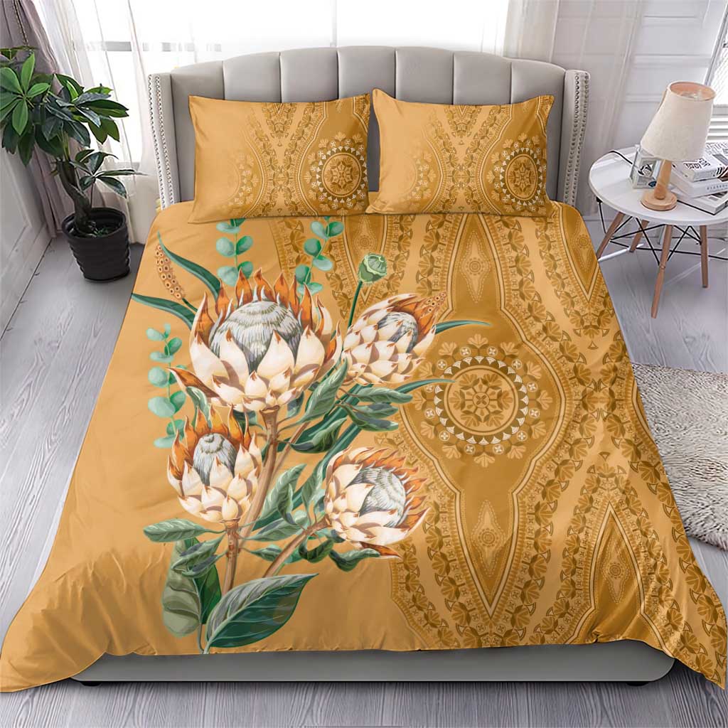Gold duvet and two pillowcases with large protea bouquet and gold medallion accents