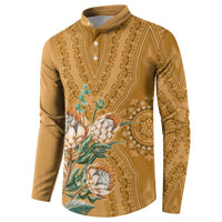 Gold dashiki motif button henley sweatshirt with floral print and paisley panels