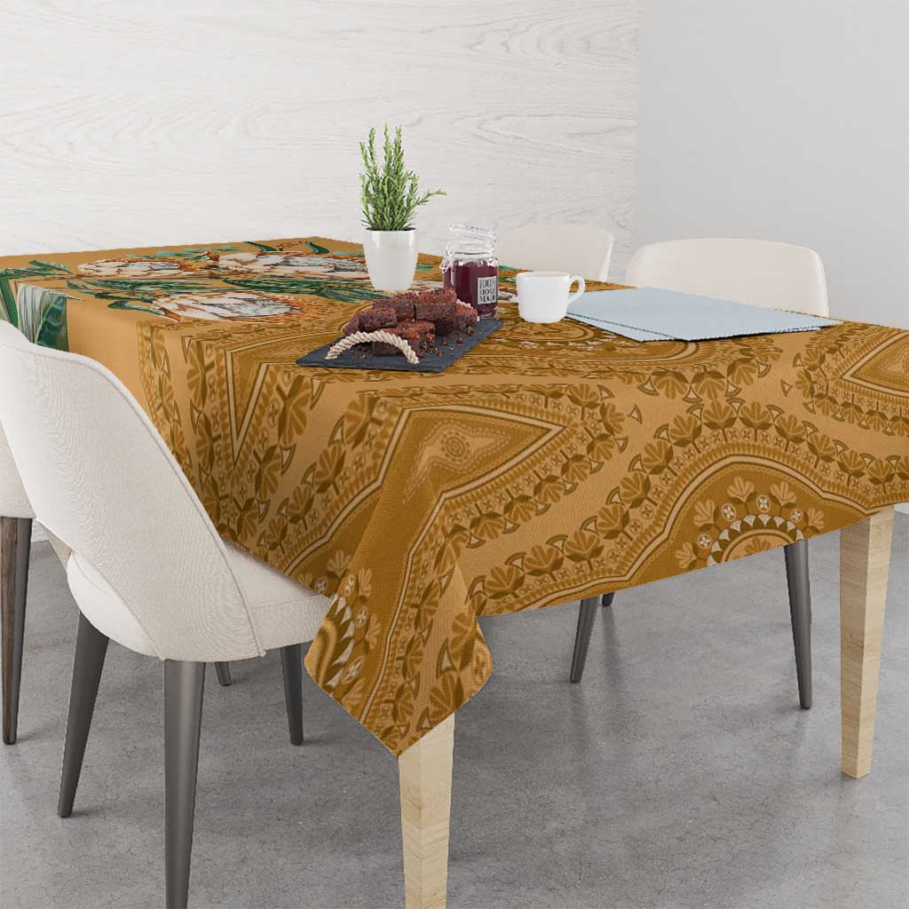 Gold patterned tablecloth with botanical motif and ornate border