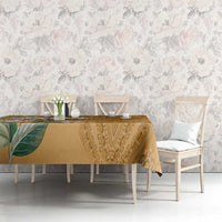 Gold tablecloth with botanical leaf motif and paisley pattern