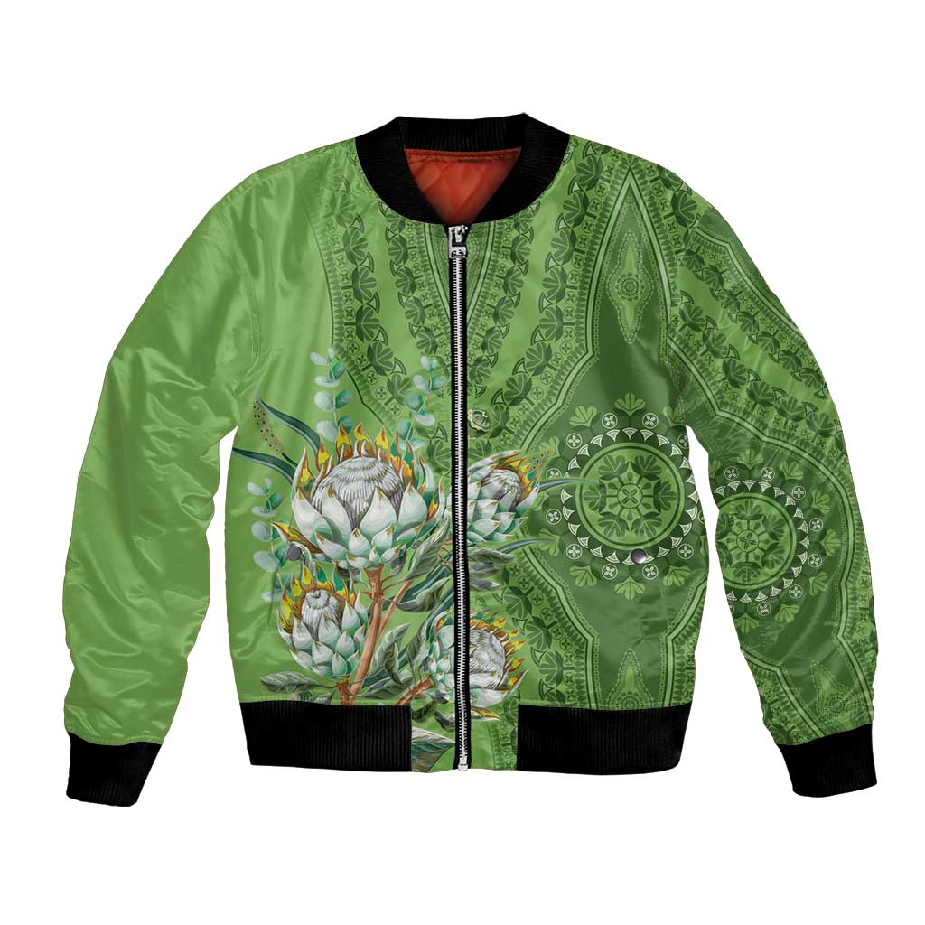 Green bomber jacket with front zipper, ribbed cuffs, and protea motif center