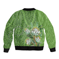 Green bomber jacket with ribbed hem and bold protea motif on back