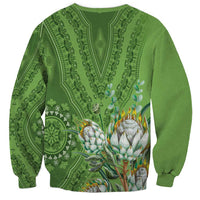 Green dashiki motif sweatshirt with protea floral back print, crewneck long sleeves