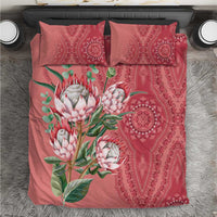 Peach bedding set with protea floral and red paisley medallion pattern, includes 2 pillowcases