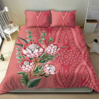 Peach bedding set with protea bouquet and ornate red damask medallion, includes 2 pillows