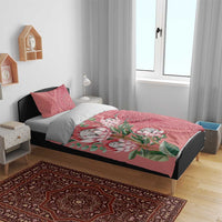 Peach bedding set with protea print on red paisley pattern, includes duvet and 2 pillowcases
