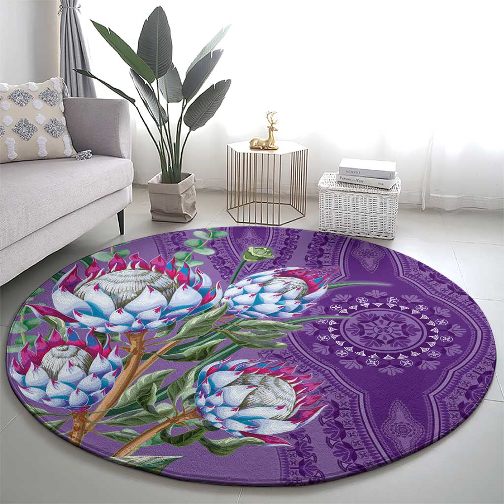 Violet round carpet with protea floral print and ornate purple mandala center