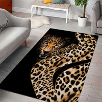 Black leopard-print area rug with tan spots and a curled tiger face medallion