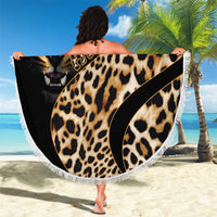 Round leopard-print beach blanket with lion face artwork, black edge, and white tassel fringe