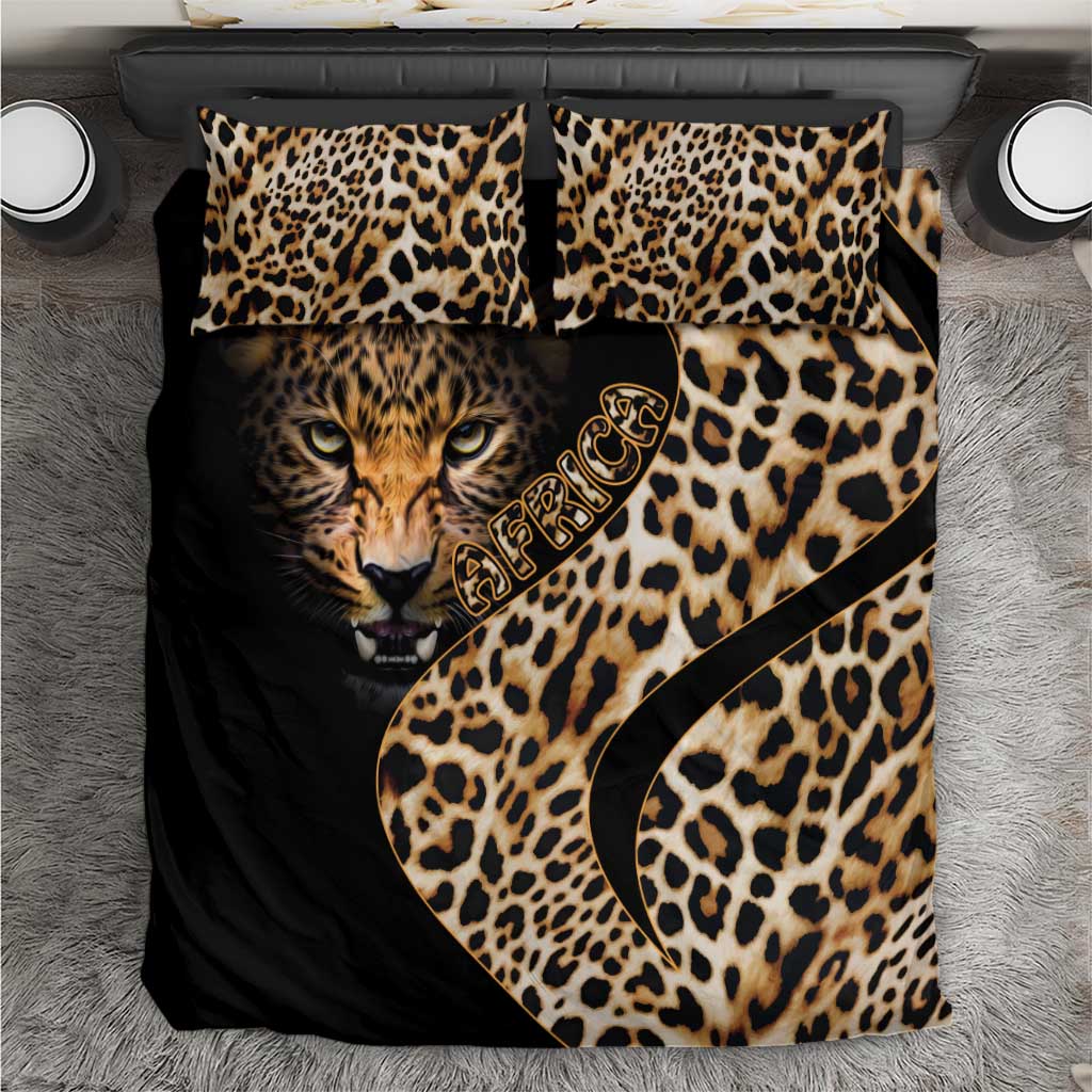 Black bedding set with leopard-print tiger face and gold script on duvet, plus two pillow shams