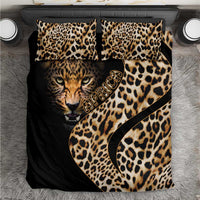 Black bedding set with leopard-print tiger face and gold script on duvet, plus two pillow shams