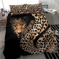 Black bedding set featuring leopard spots and a tiger face graphic with gold script, two pillow shams