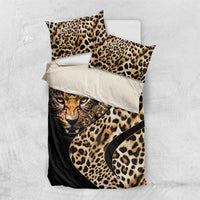 Black bedding set with leopard-print tiger face on duvet and two pillow shams in leopard spots