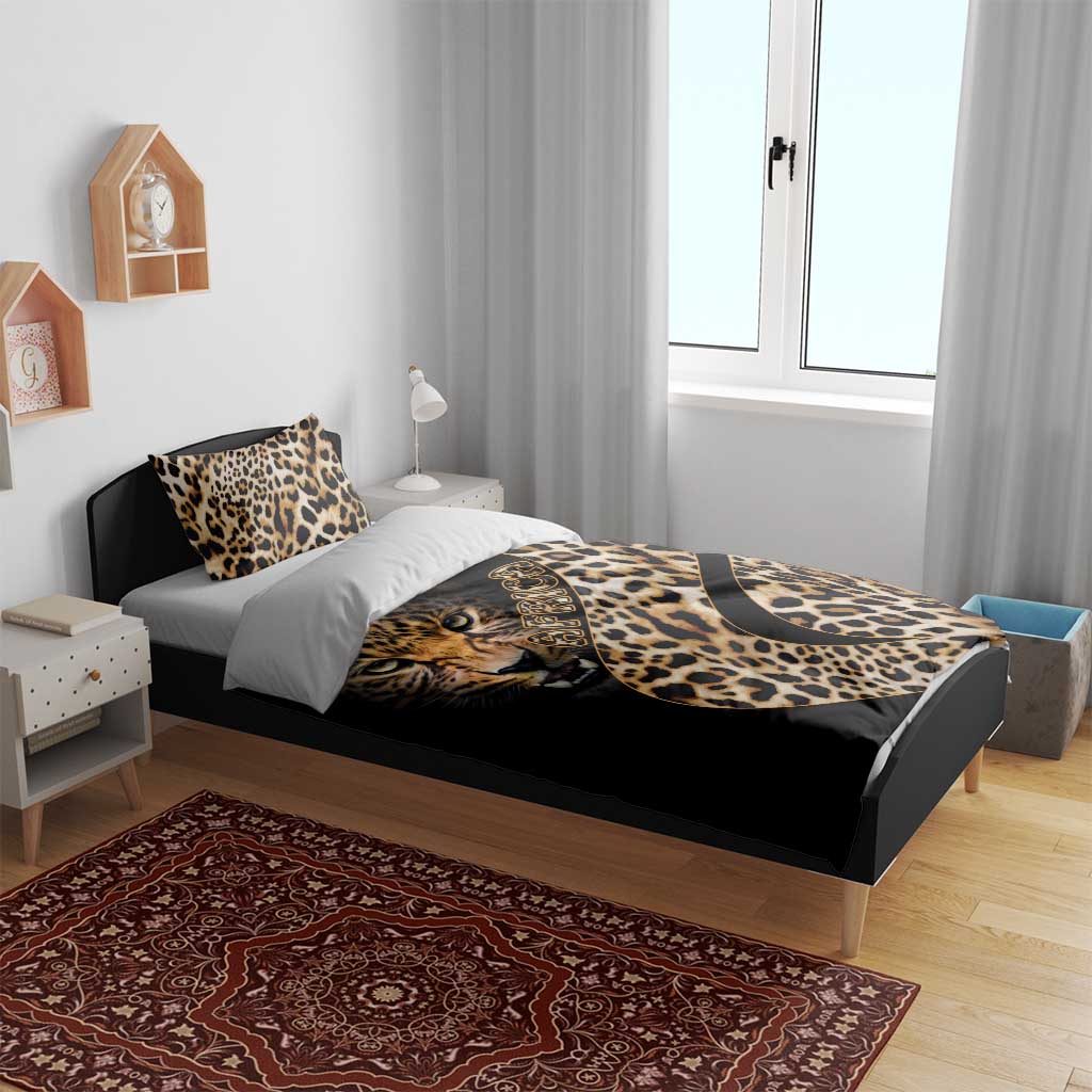 Black bedding set with leopard-print tiger graphic and gold script, plus two pillow shams