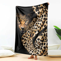 Black leopard-pattern blanket featuring large cat face and gold script