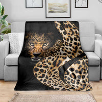 Black and gold leopard-print blanket with cat face center and gold script