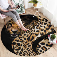 Round leopard-print carpet with cat face and tan spots, featuring decorative black border.