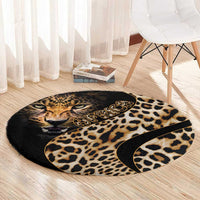Round leopard-print carpet with cat face and tan spots on black, with decorative emblem.