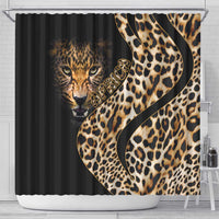 Leopard skin shower curtain with metal top rings, black background and gold leopard graphics