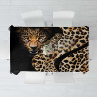African leopard skin pattern tablecloth, black and tan with curved decorative border.