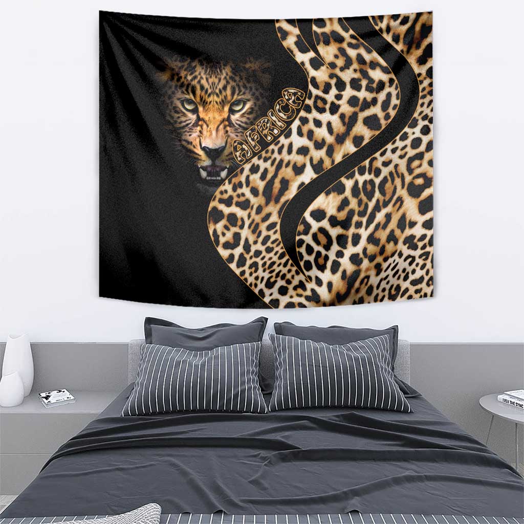 Black tapestry with centered leopard face, tan spots, and Africa-style text