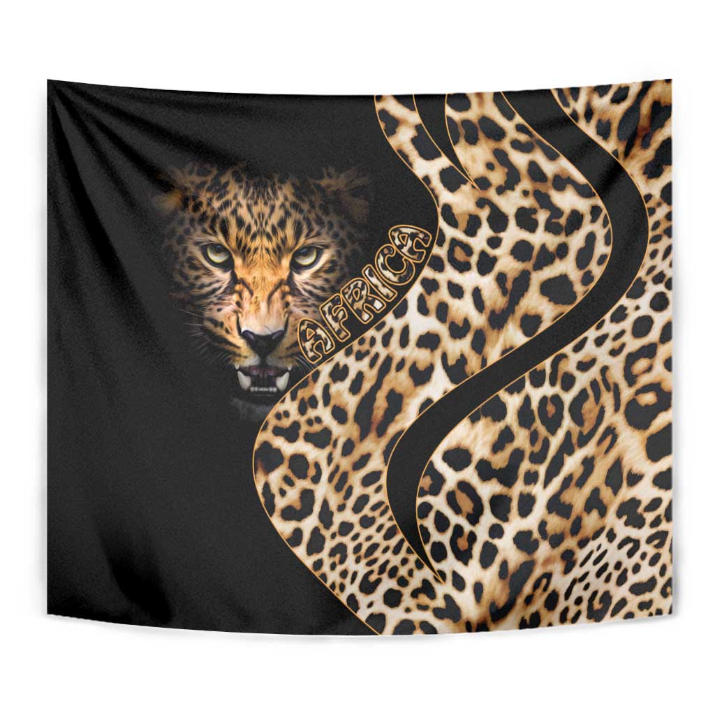 Close-up black tapestry with leopard face, tan spots, and stylized lettering