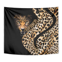 Close-up black tapestry with leopard face, tan spots, and stylized lettering