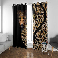 Leopard-print window curtains with black fabric and tan cheetah pattern on sheer light background