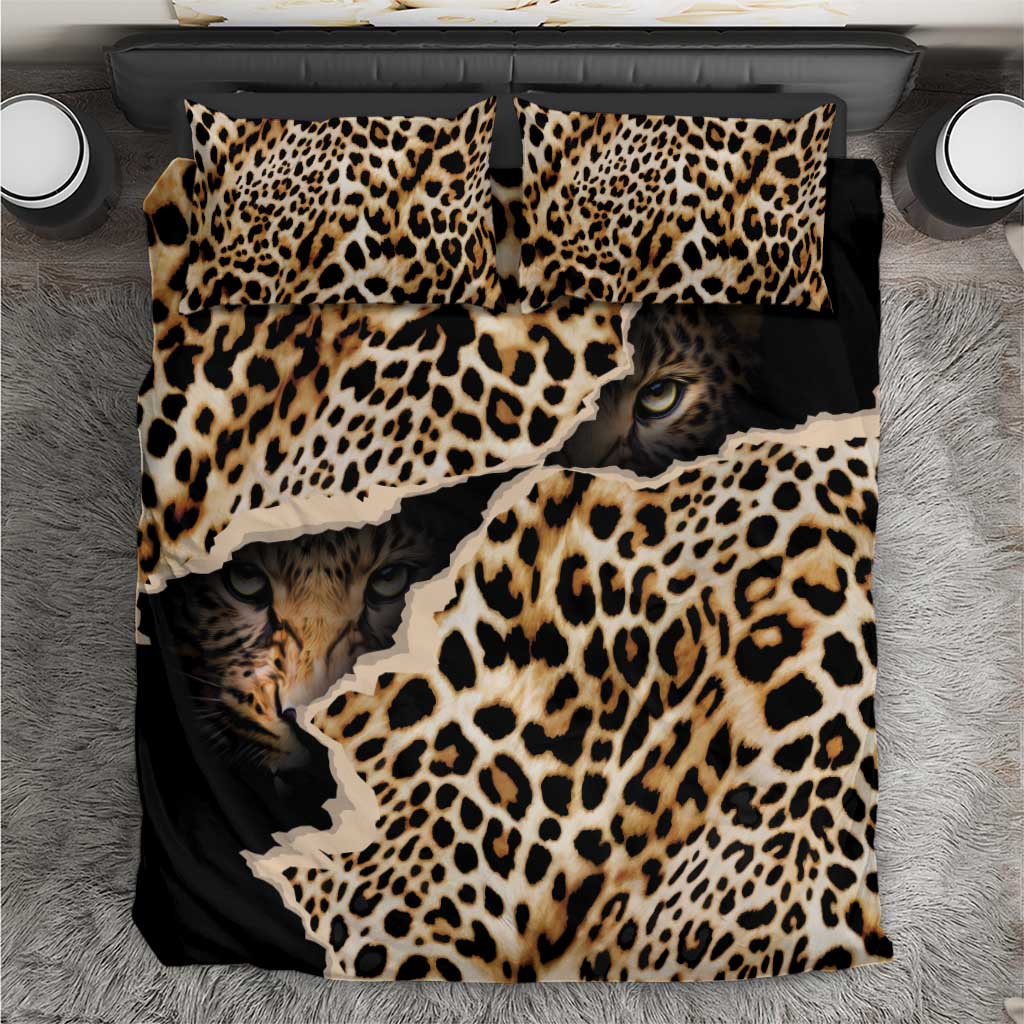 Black leopard-print bedding set top view with cat faces on duvet and pillowcases