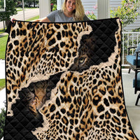 African leopard-skin pattern quilt with black quilted backing and large cat face print
