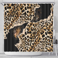 Leopard print shower curtain with wildcat eyes and partial faces; top metal rings