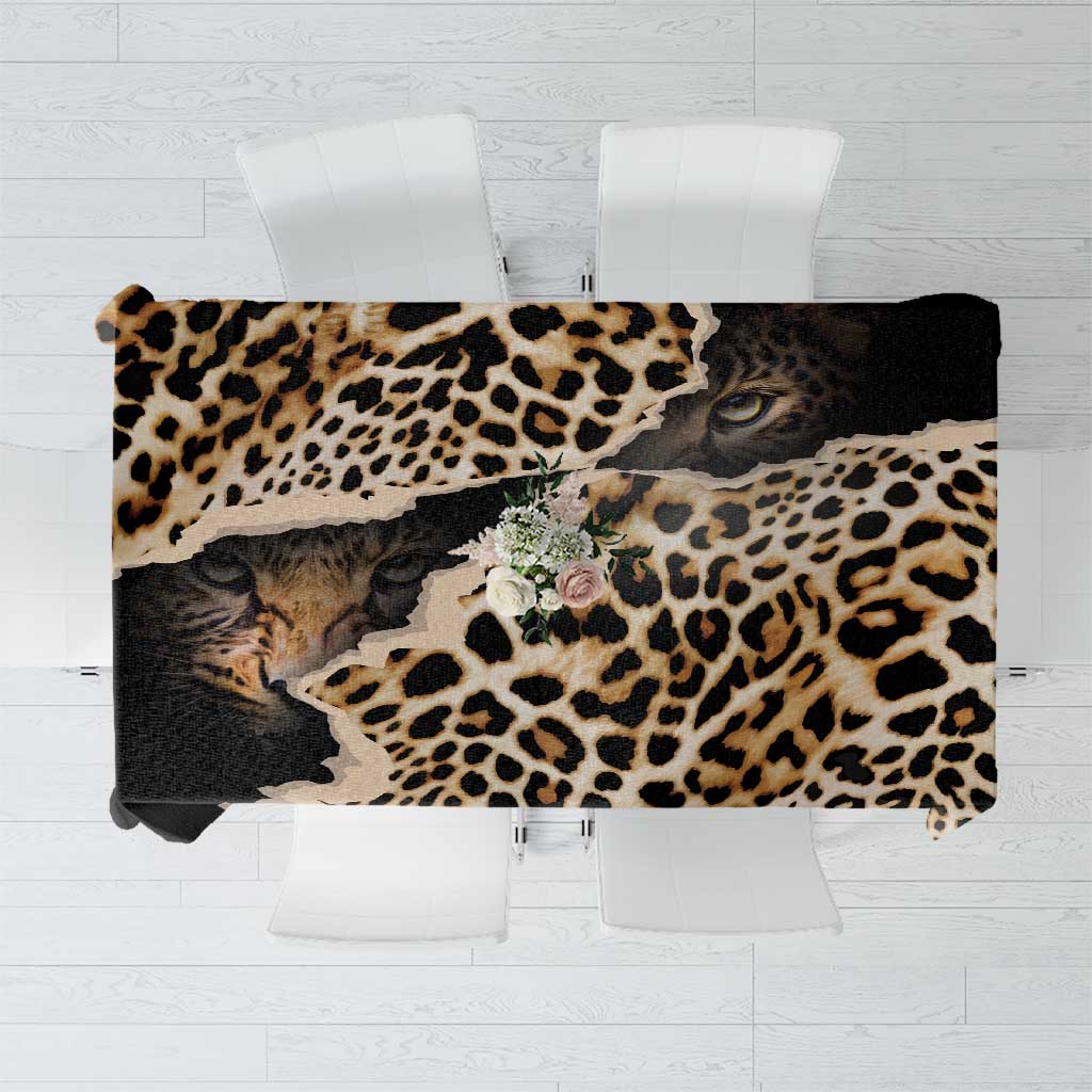 Black and tan leopard-print tablecloth with wide dark border