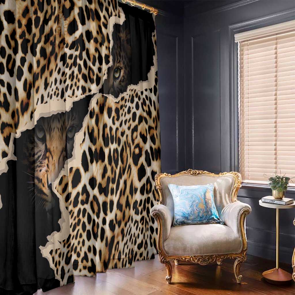 Leopard print window curtains in black with tan spots and a visible cat eye