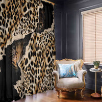 Leopard print window curtains in black with tan spots and a visible cat eye