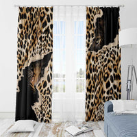Black window curtain panels with tan leopard spots and cat-face graphic near hem