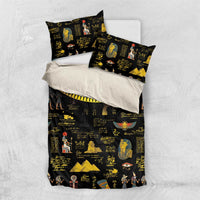 Black bedding set with gold Egyptian hieroglyph and pharaoh prints, two pillowcases and duvet