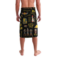 Black Egyptian print shorts with green-gold border at waistband