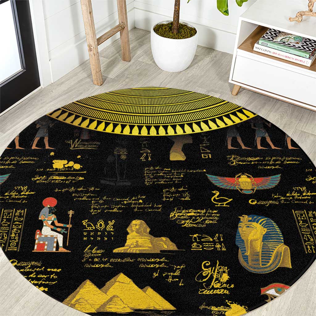 Black round hieroglyph-style carpet with Egyptian figures and gold border
