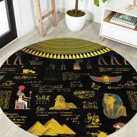 Black round hieroglyph-style carpet with Egyptian figures and gold border