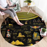 Black round hieroglyph-style carpet with Egyptian motifs, gold border, and pyramids