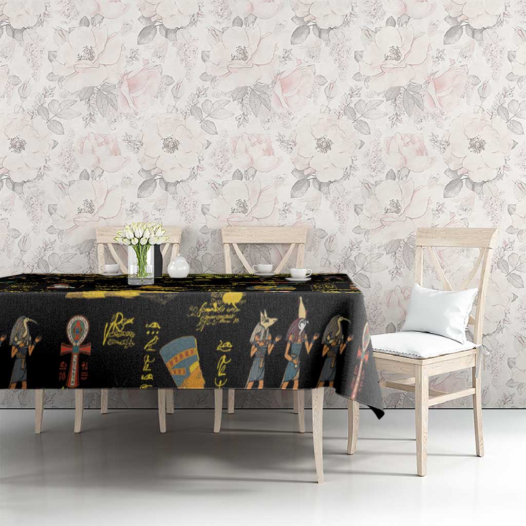Black Ancient Egypt tablecloth on rectangular table with gold hieroglyph and figure print