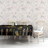 Black Ancient Egypt tablecloth on rectangular table with gold hieroglyph and figure print