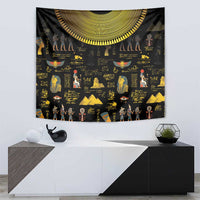 Black tapestry featuring gold Egyptian scenes, hieroglyph-style writing, and crescent arc border