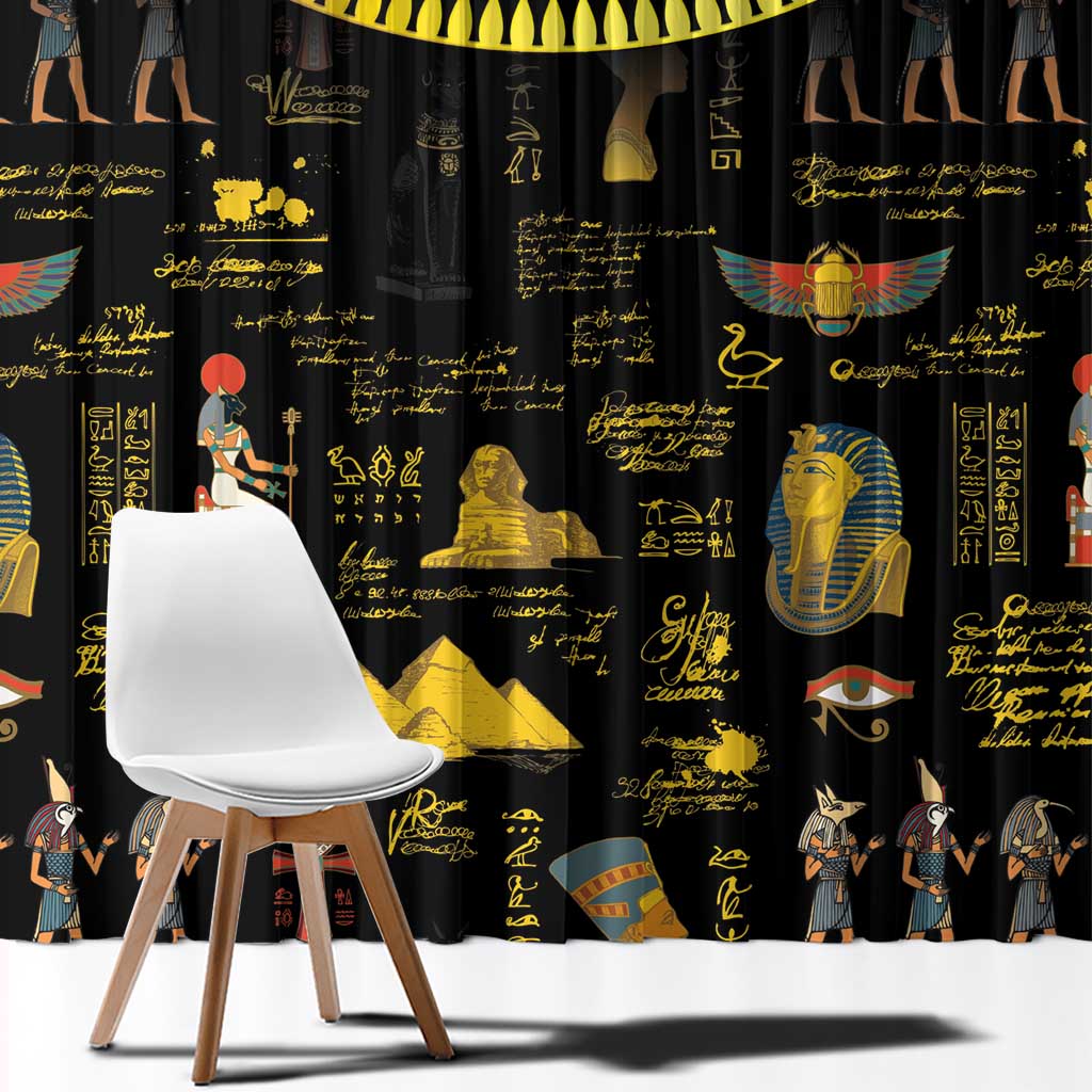 Black Egyptian window curtain fabric panel with gold hieroglyph and pyramid motifs, straight hem.