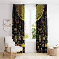 Pair of black Egyptian window curtains with gold valance and repeated hieroglyph and icon print.